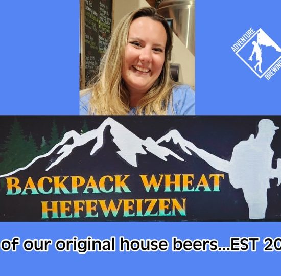 Rachel with backpack wheat sign