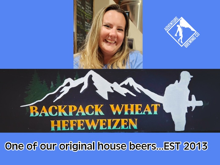 Rachel with backpack wheat sign